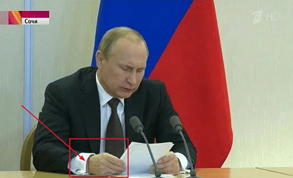 Putin and a red thread on his wrist