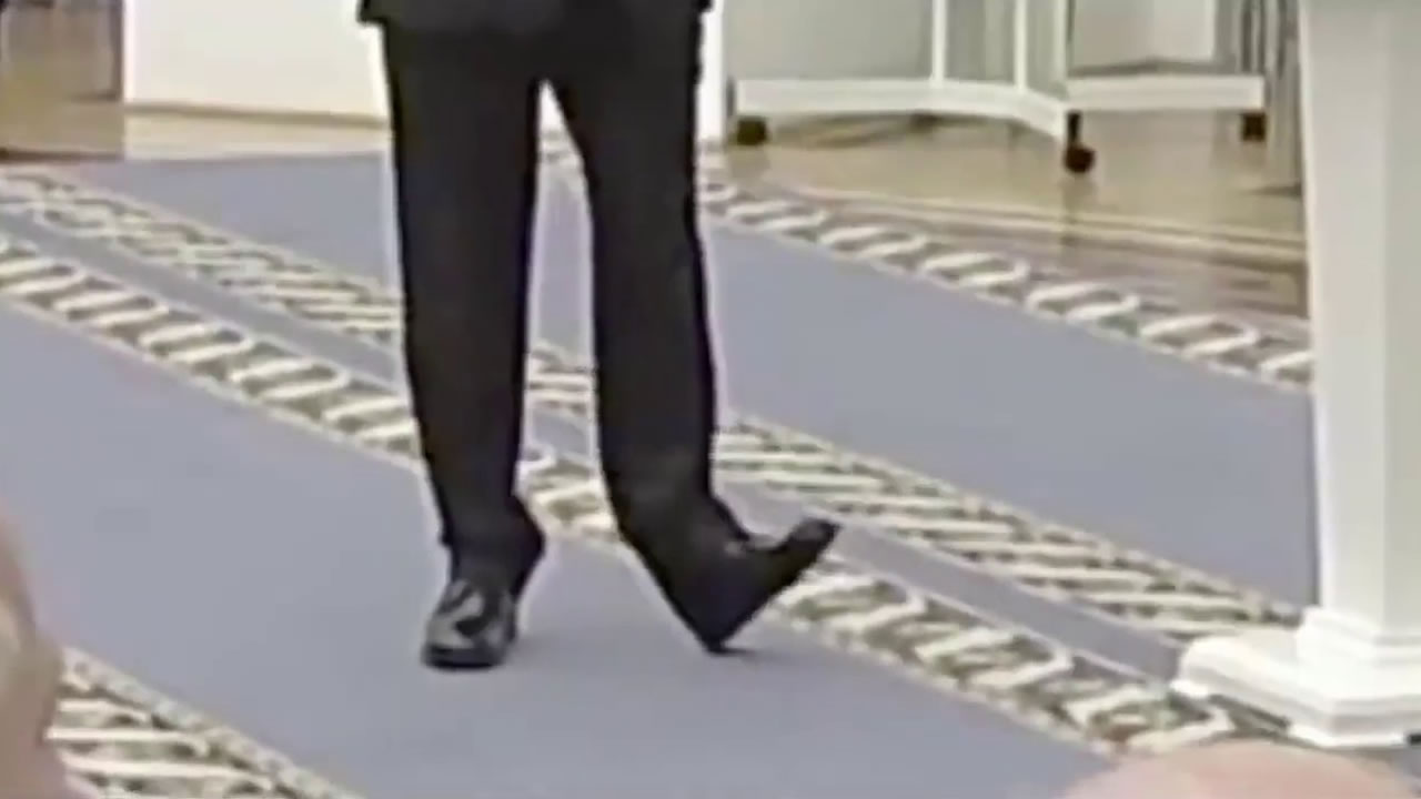 Putin's strange shoes