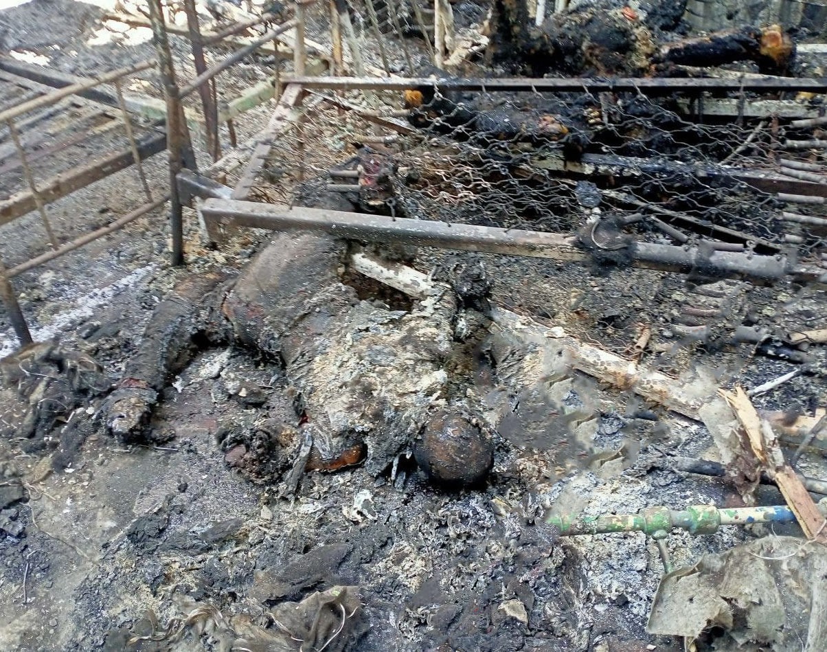Burnt corpses in the barracks