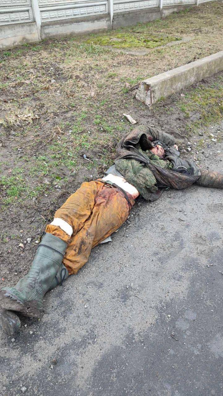 Corpse of a Russian soldier in yellow pants
