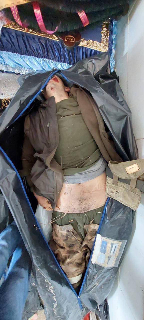 The corpse of a Russian military man in a bag