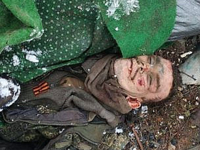 Труп российского солдата с георгиевской лентой