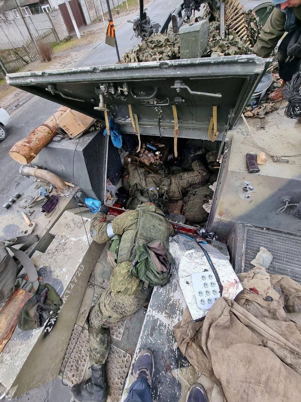 The corpses of Russian soldiers in an armored personnel carrier